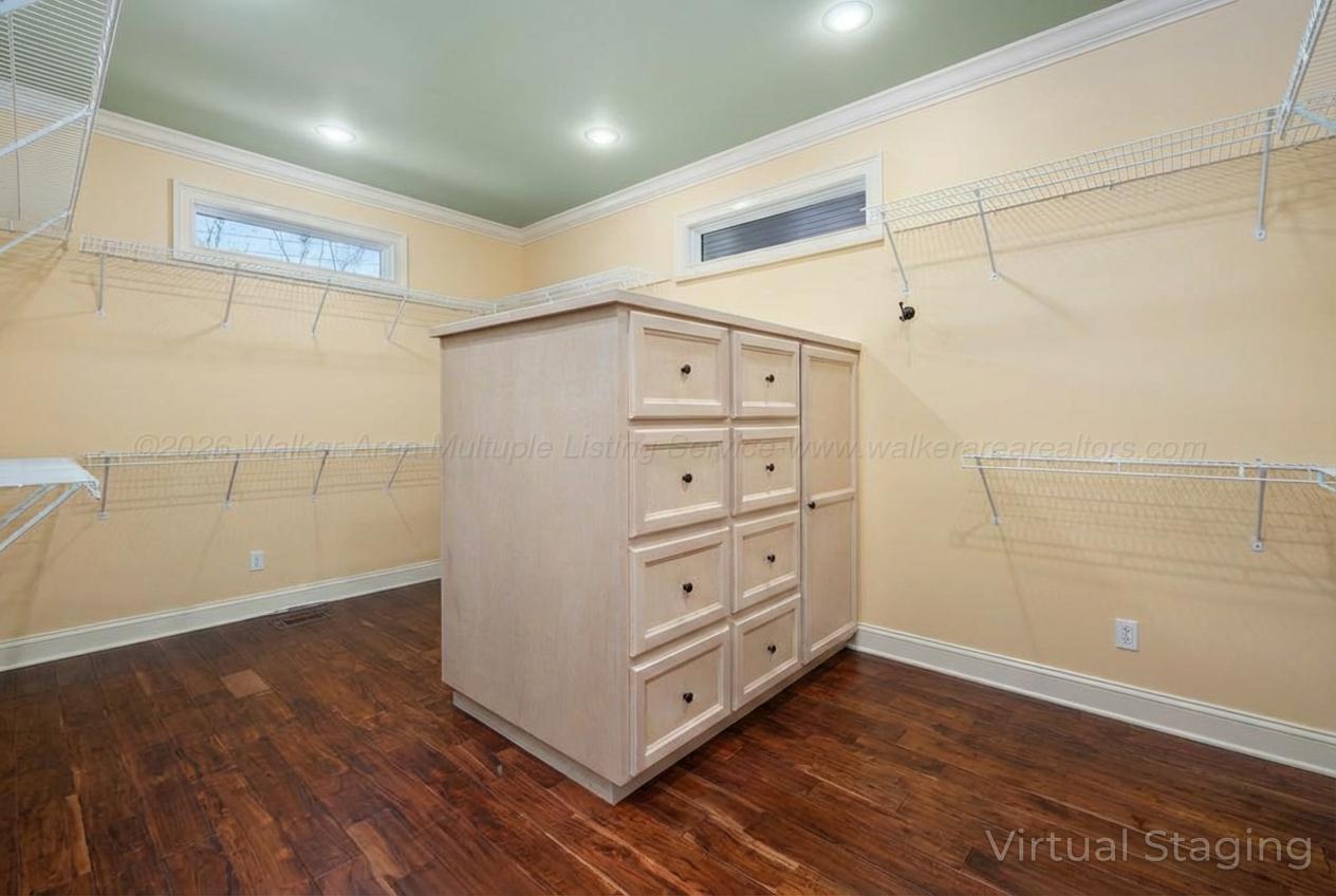 392 Baughn Road Jasper, AL 35503 - Photo 18 of 40 One of the many large walk-in closets in this home with built-in drawer storage.