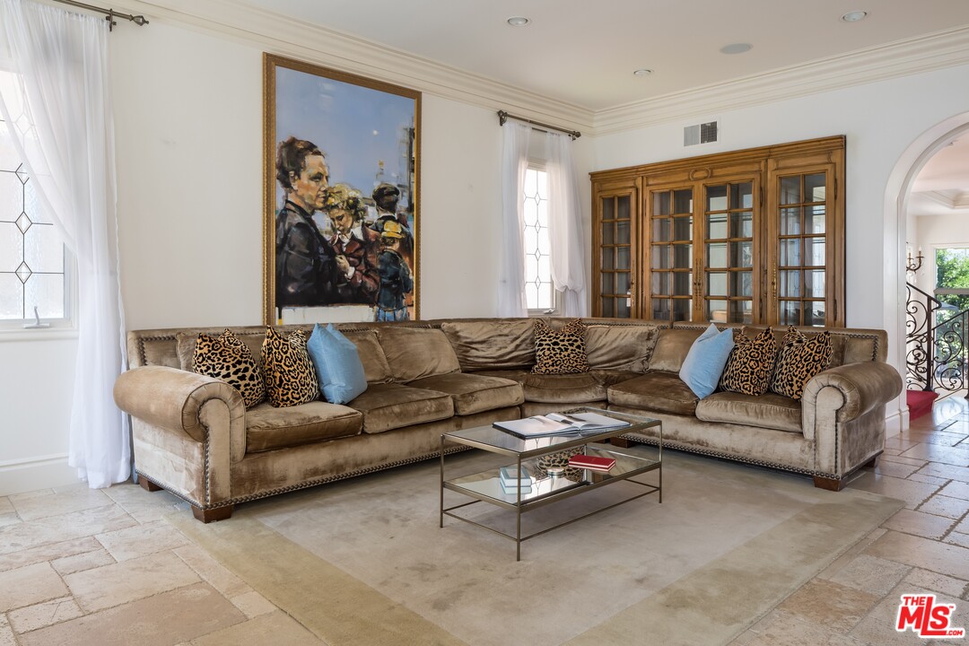 129 Roma Court Marina del Rey, CA 90292 - Photo 20 of 42 a living room with furniture and a large window