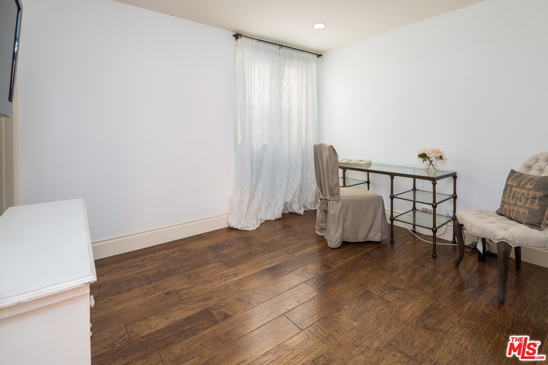 129 Roma Court Marina del Rey, CA 90292 - Photo 33 of 42 a view of livingroom with furniture and wooden floor