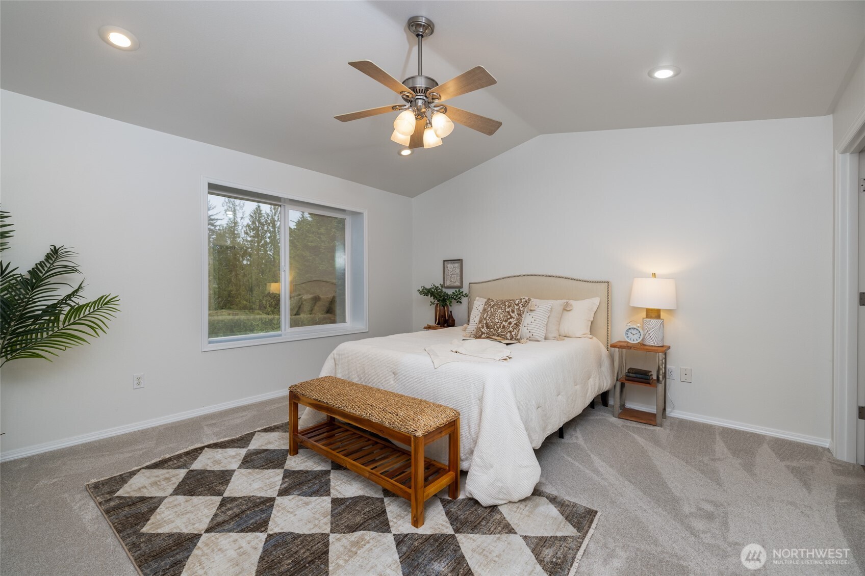 19366 Parson Creek Road Burlington, WA 98233 - Photo 15 of 31 a bedroom with a bed and a window