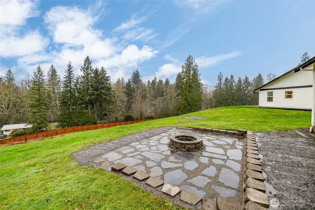 a view of a backyard with a garden