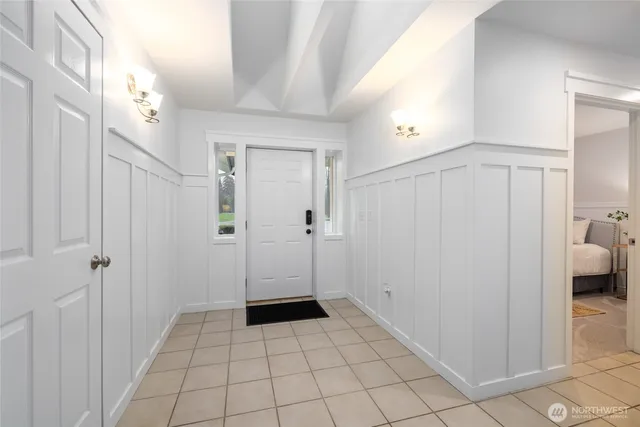 a view of a bathroom with a sink and mirror