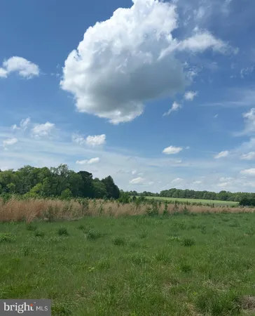 a view of mountain with lake view