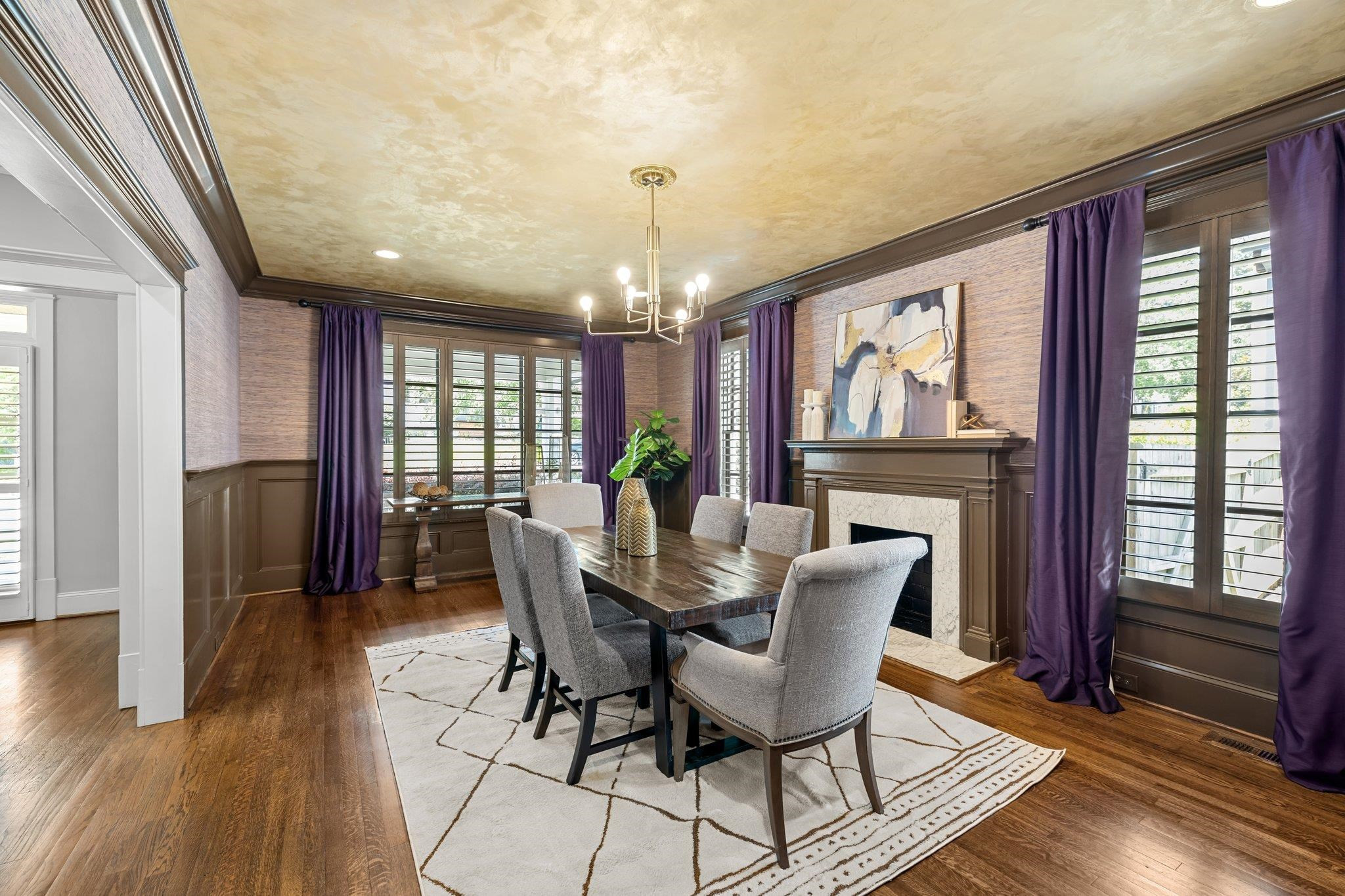 2116 Cowper Drive Raleigh, NC 27608 - Photo 17 of 65 Make memories under the custom ceiling and bask in the glow of a designer chandelier. Dining Room