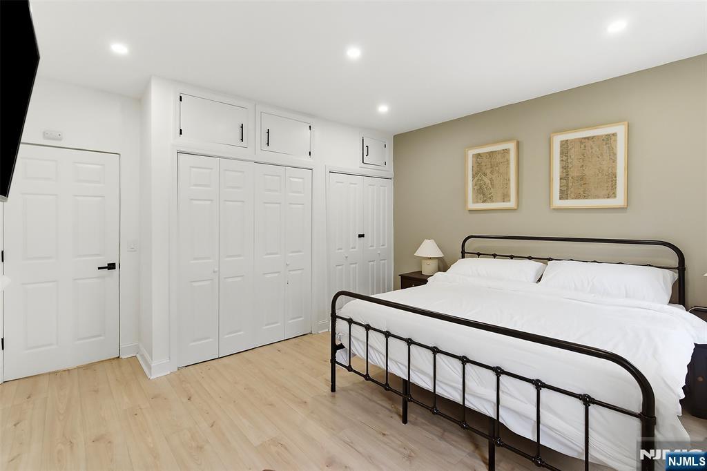 22 8th Avenue Newark, NJ 07104 - Photo 15 of 26 a bedroom with a bed and a window