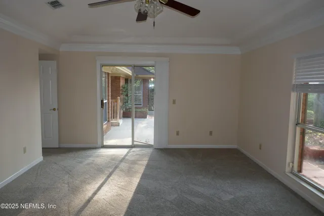 an empty room with windows