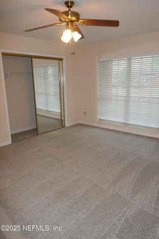 a view of a room with a window