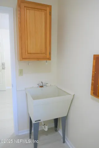 a view of a lake with a yard