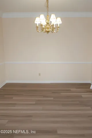 a view of a room with an empty space