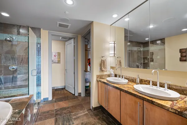 a bath tub sitting next to a bathroom
