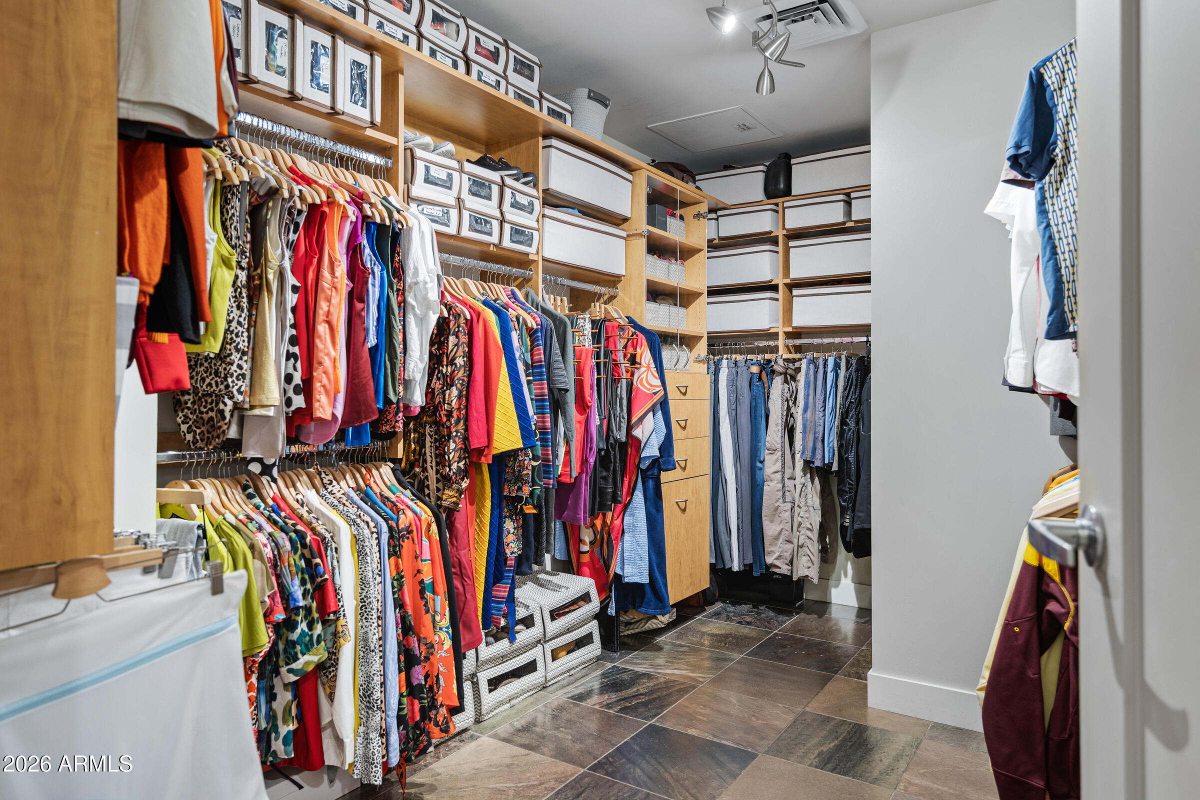 140 East Rio Salado Parkway, Unit 610 Tempe, AZ 85281 - Photo 18 of 57 a view of walk in closet with clothes