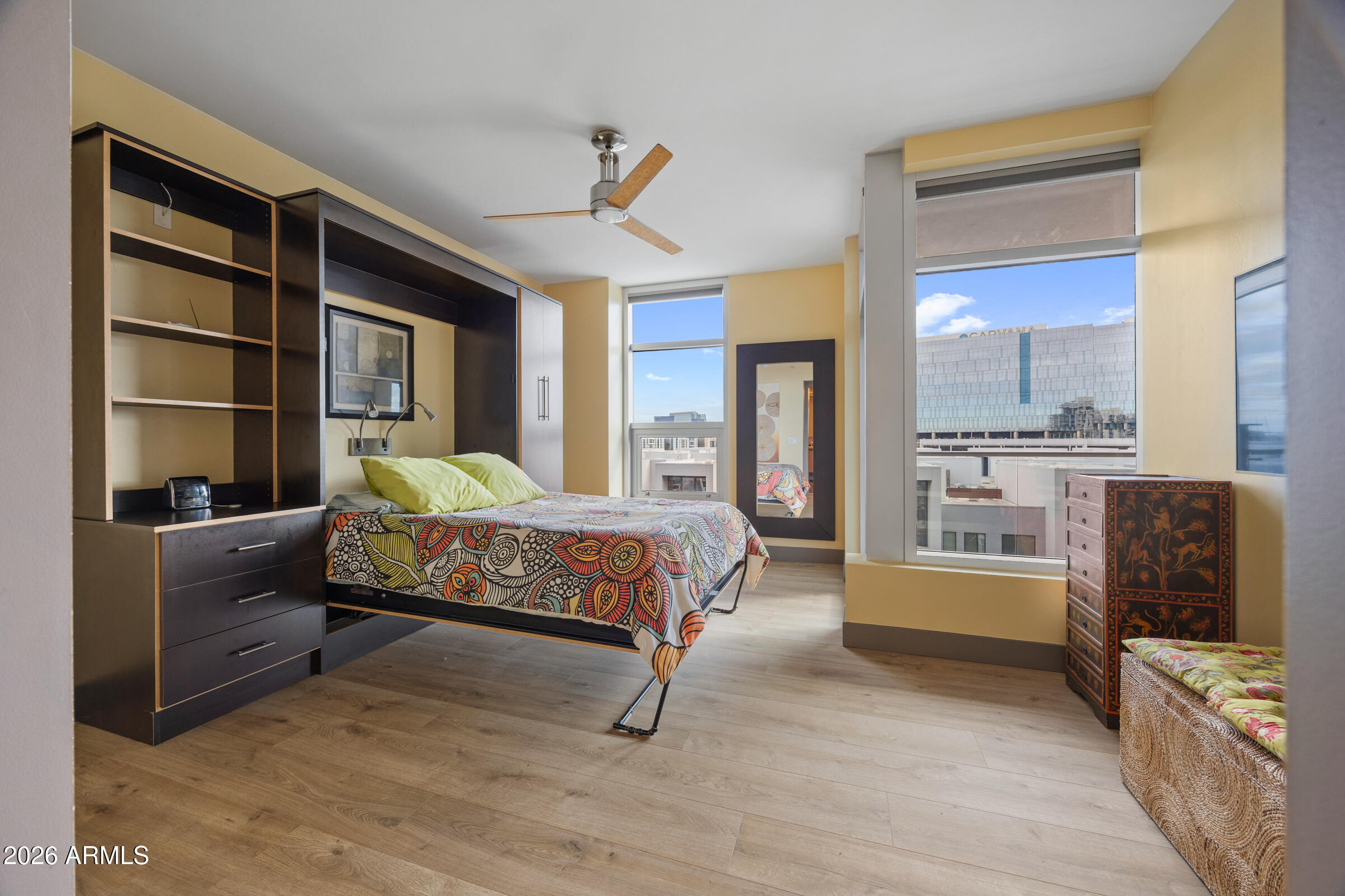 140 East Rio Salado Parkway, Unit 610 Tempe, AZ 85281 - Photo 21 of 57 a bedroom with a bed and a view of kitchen