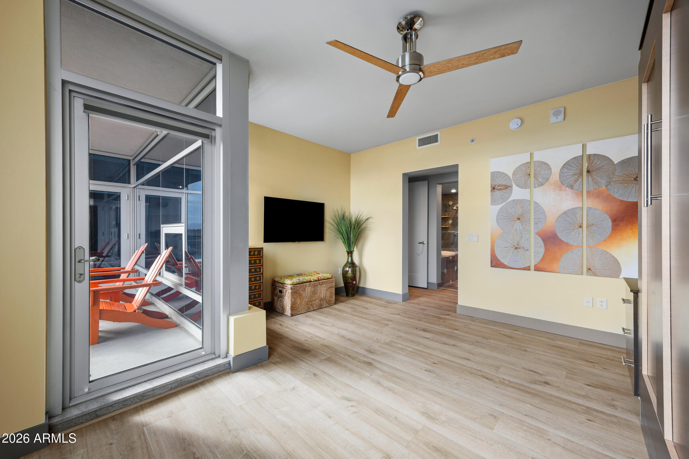 140 East Rio Salado Parkway, Unit 610 Tempe, AZ 85281 - Photo 22 of 57 a view of a livingroom with furniture and a flat screen tv