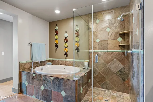 a view of a bedroom with washer and dryer