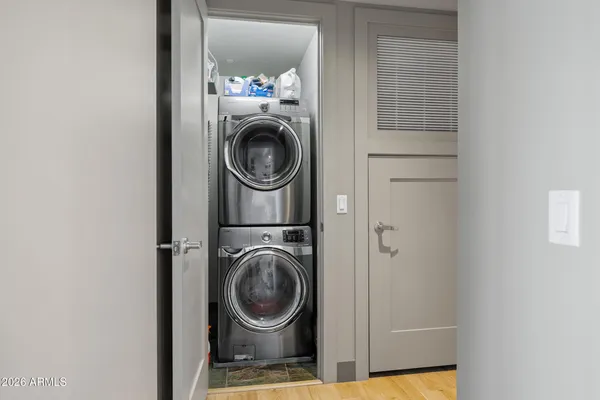 a view of a balcony with chairs