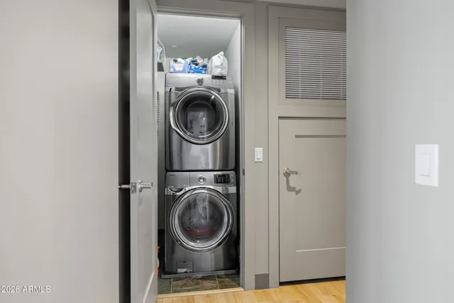 a view of a balcony with chairs