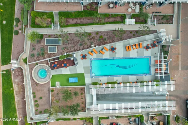 a view of a patio with swimming pool