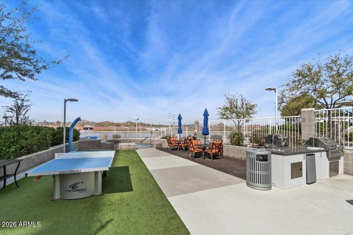140 East Rio Salado Parkway, Unit 610 Tempe, AZ 85281 - Photo 41 of 57 a view of a swimming pool with outdoor seating and a garden
