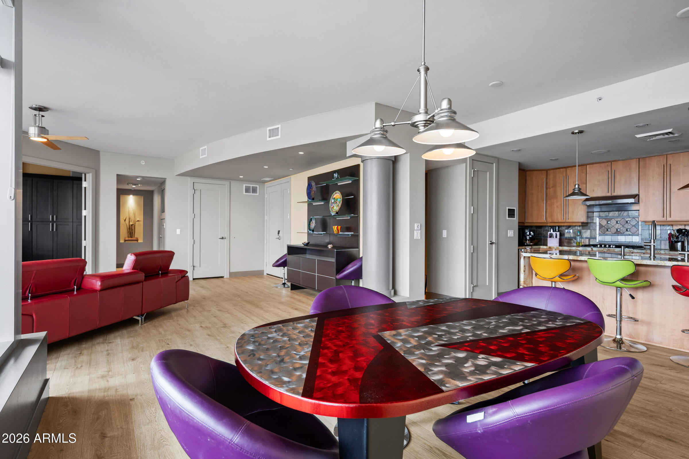 140 East Rio Salado Parkway, Unit 610 Tempe, AZ 85281 - Photo 5 of 57 a living room with furniture and kitchen view