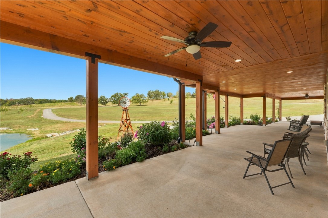8800 Fred Austin Road Decatur, AR 72722 - Photo 35 of 60 Front porch area, perfect for watching the sunsets, golf rounds or skeet shooting right off the porch