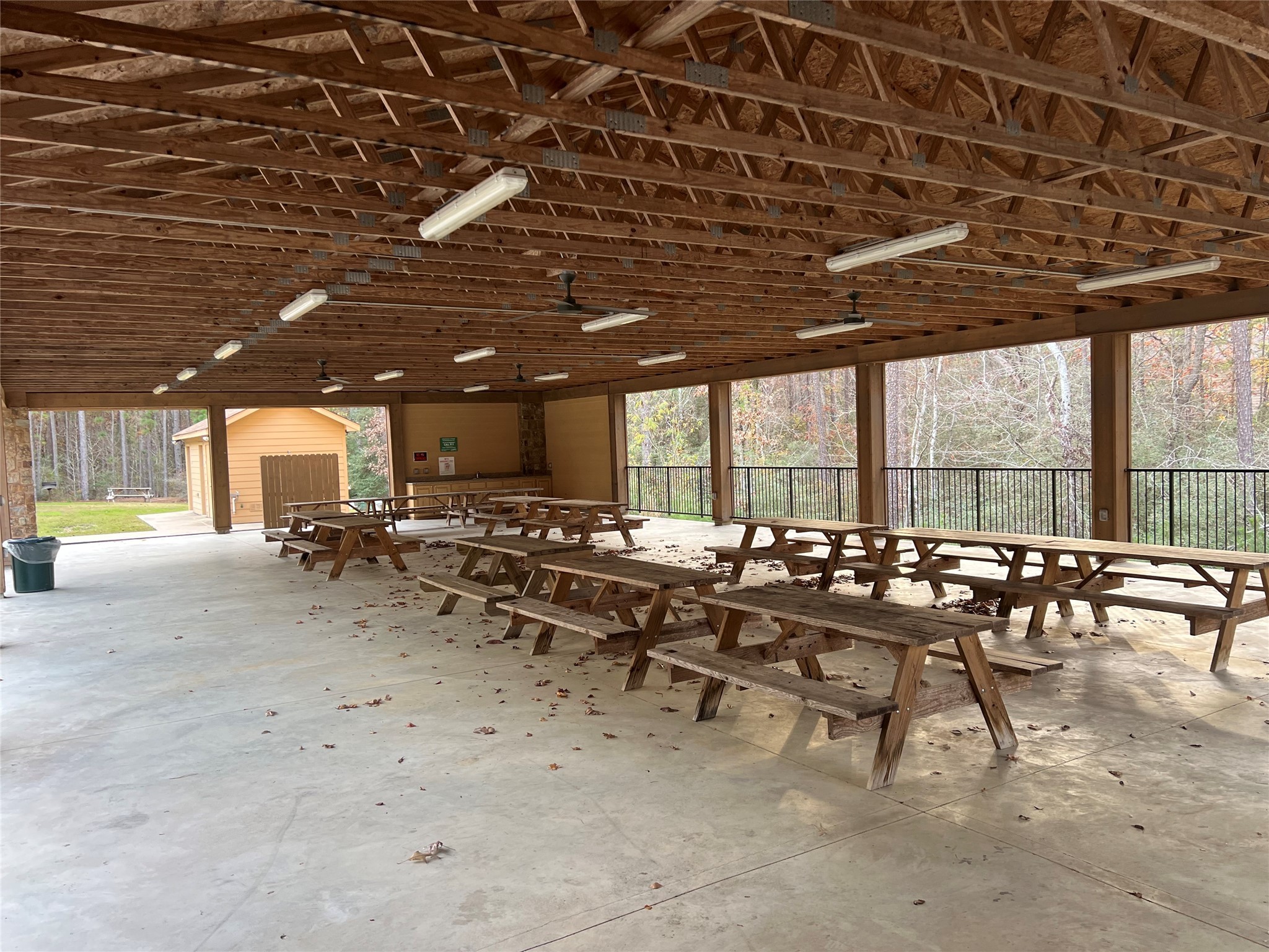 Tbd Bay Hill Road Point Blank, TX 77364 - Photo 16 of 21 a outdoor space with lots of chairs a chandelier and a projector