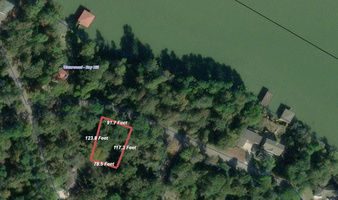 Tbd Bay Hill Road Point Blank, TX 77364 - Photo 10 of 21 an aerial view of a house with a yard and street view