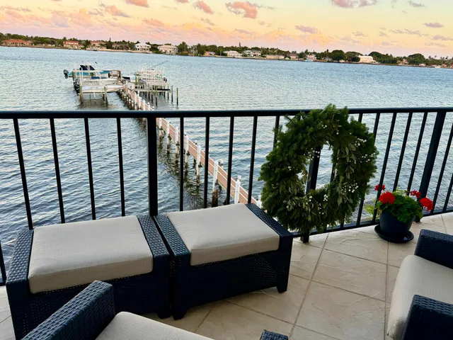 a view of a balcony with lake view