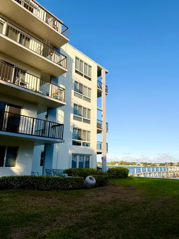 a room with furniture and wooden floor