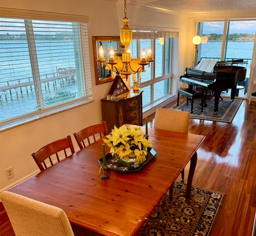 a kitchen with stainless steel appliances granite countertop a refrigerator and a stove