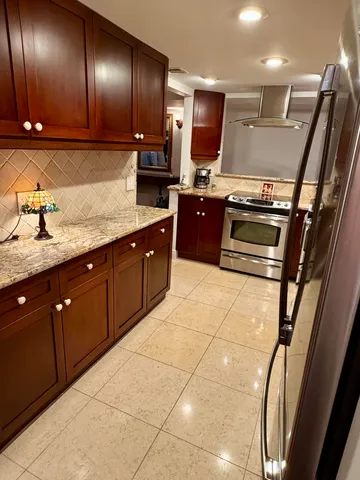 a view of balcony with furniture