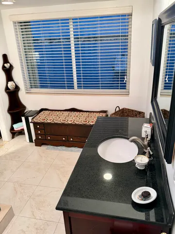 a bathroom with a shower and toilet