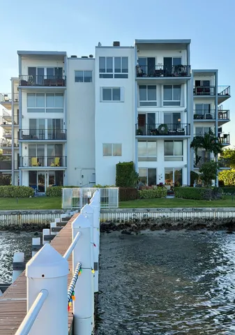 a view of a rooftop with chairs