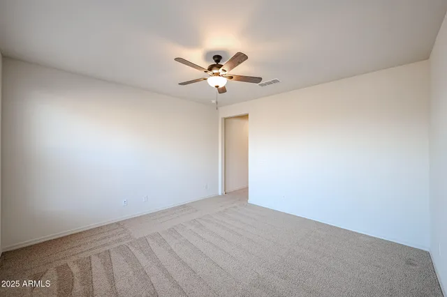 a view of a big room with carpet