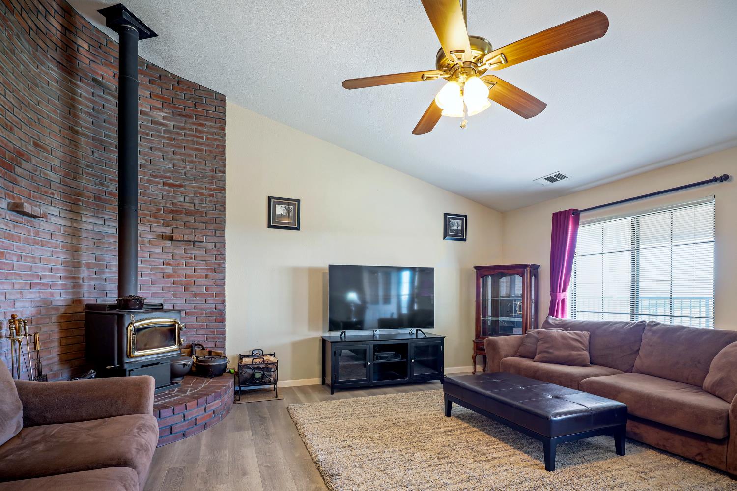 2 Katelyn Court Valley Springs, CA 95252 - Photo 17 of 98 a living room with furniture and a flat screen tv