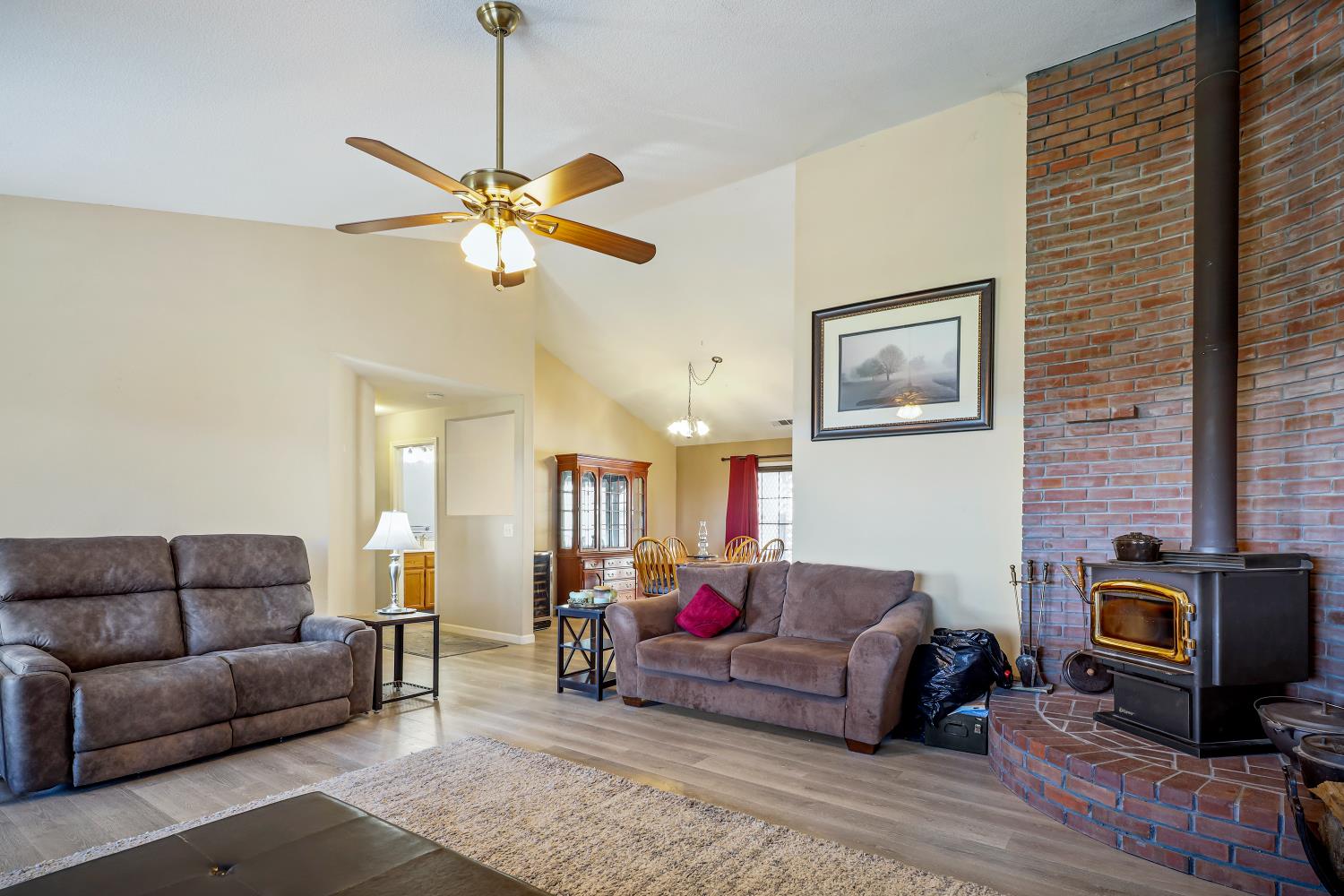 2 Katelyn Court Valley Springs, CA 95252 - Photo 19 of 98 a living room with furniture a couch and a flat screen tv