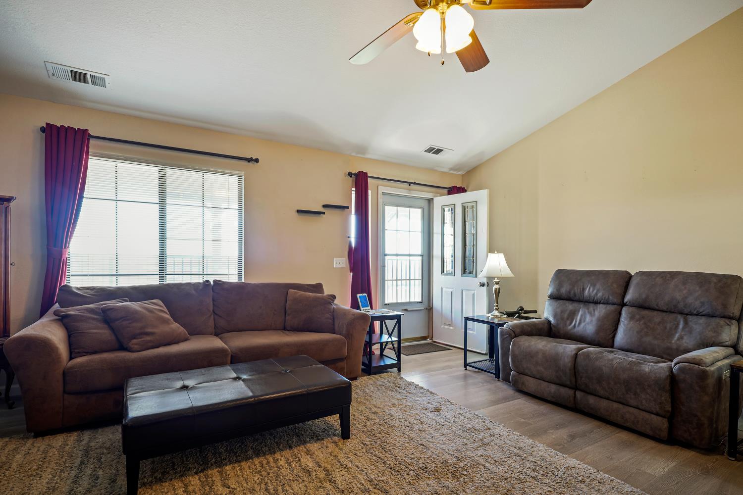 2 Katelyn Court Valley Springs, CA 95252 - Photo 20 of 98 a living room with furniture a chandelier and a window