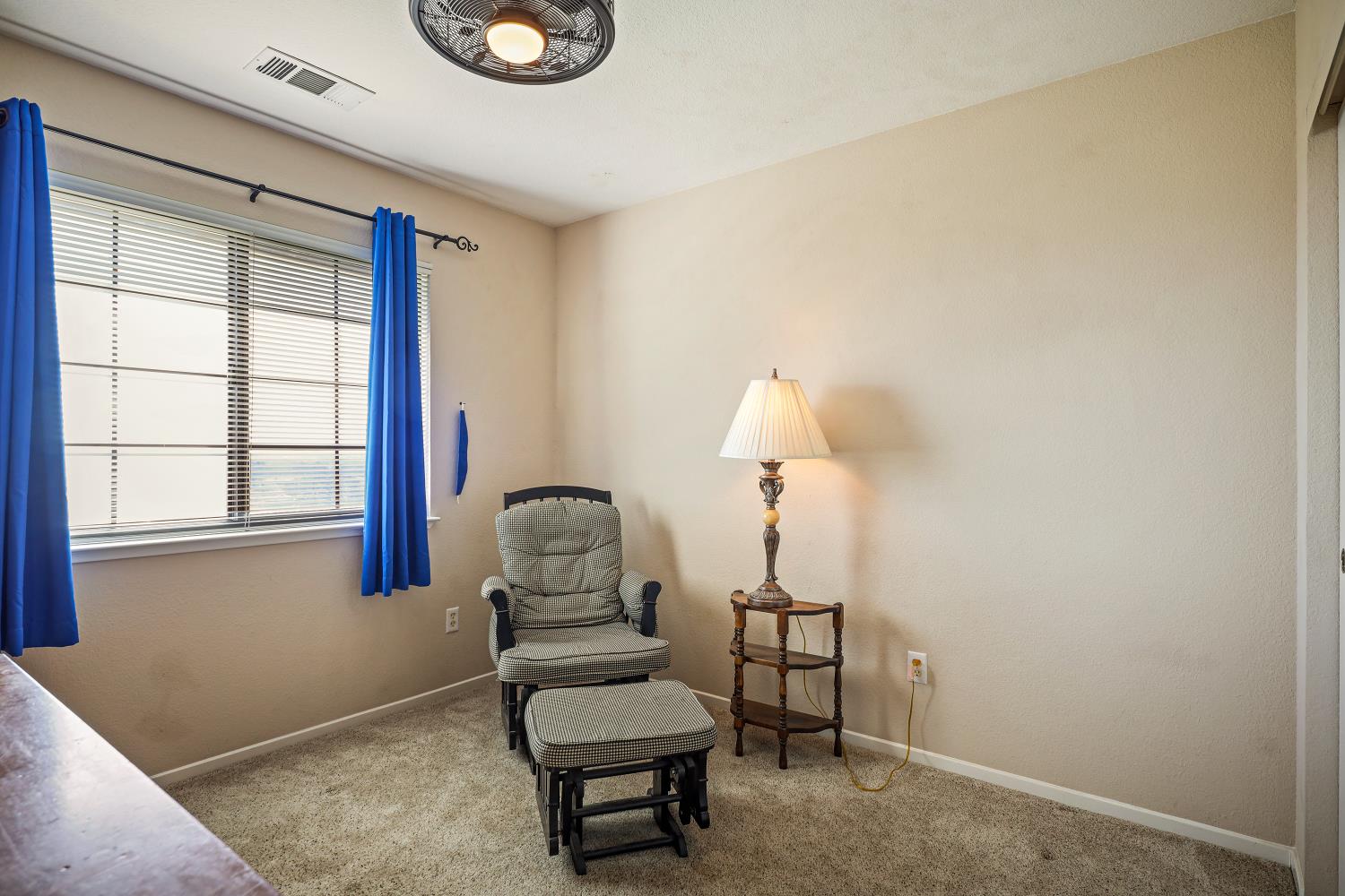 2 Katelyn Court Valley Springs, CA 95252 - Photo 31 of 98 a living room with furniture and a window
