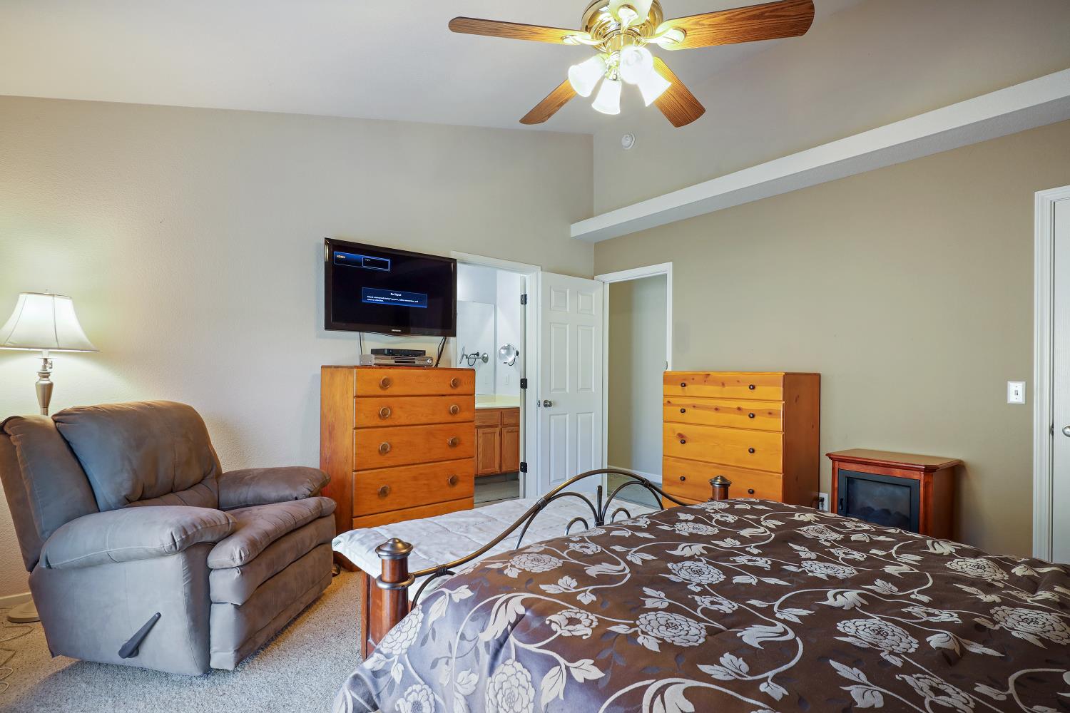 2 Katelyn Court Valley Springs, CA 95252 - Photo 35 of 98 a bedroom with a bed and a television