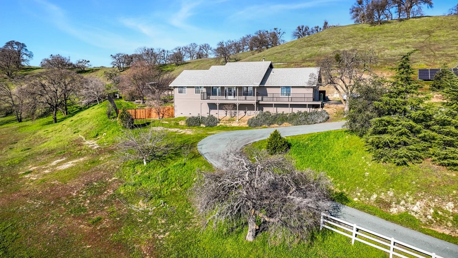 2 Katelyn Court Valley Springs, CA 95252 - Photo 84 of 98 a aerial view of a house with a big yard and large trees