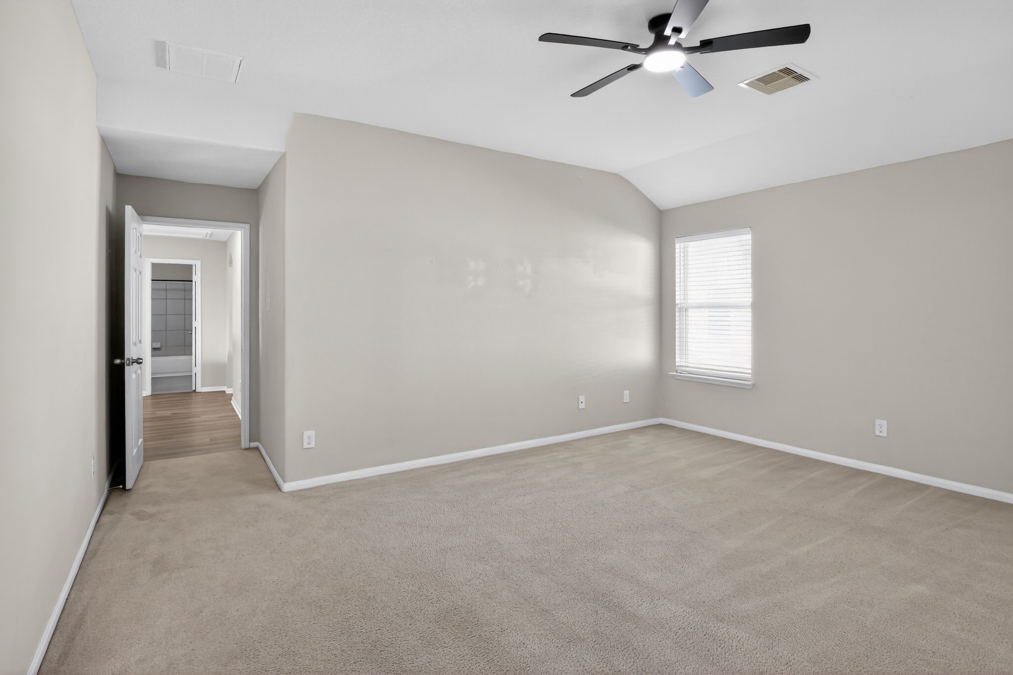 4938 Yearling Ridge Court Katy, TX 77449 - Photo 25 of 29 a view of an empty room with a window