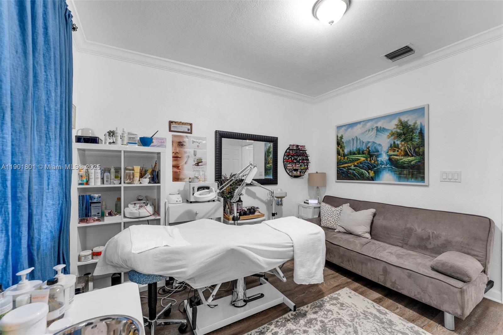 1595 Northeast 33rd Road, Unit 1123 Homestead, FL 33033 - Photo 15 of 34 a living room with furniture and a painting on the wall
