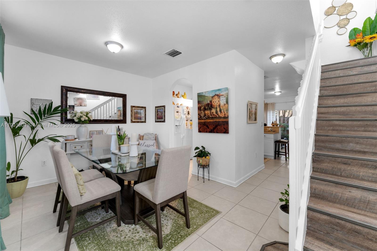 1595 Northeast 33rd Road, Unit 1123 Homestead, FL 33033 - Photo 4 of 34 a dining room with furniture and window