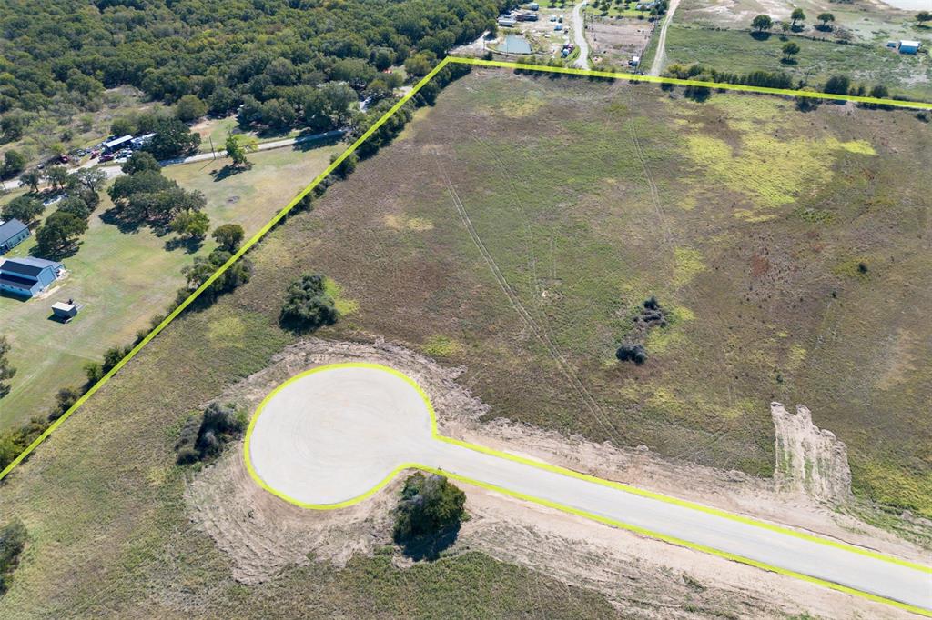 Tbd Wilson Road Perrin, TX 76486 - Photo 27 of 30 a view of a swimming pool with a yard and large trees