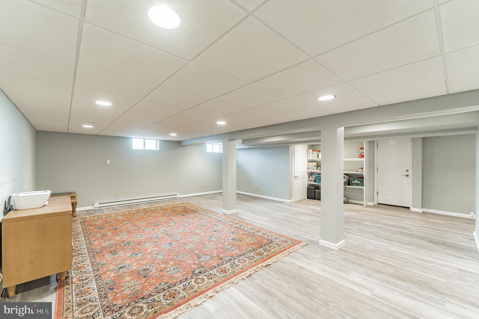 107 Brookhill Road Newtown Square, PA 19073 - Photo 25 of 28 a view of an empty room with wooden floor