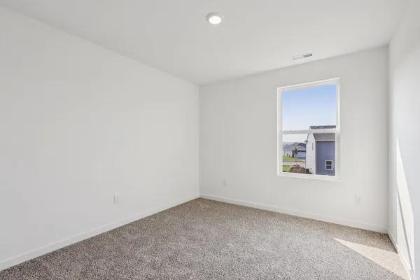 a bathroom with 2 sink and a mirror