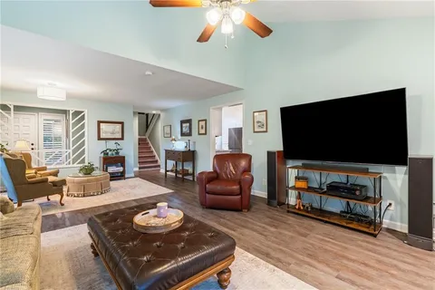 a kitchen with stainless steel appliances a stove microwave and cabinets