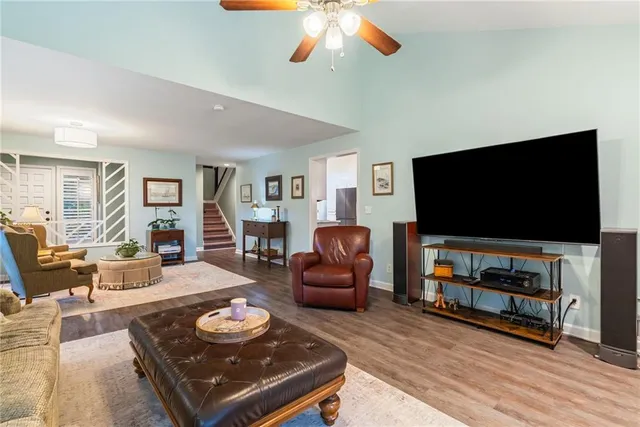 a kitchen with stainless steel appliances a stove microwave and cabinets