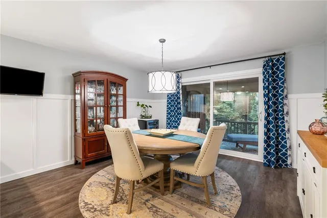 a large kitchen with lots of counter space and stainless steel appliances