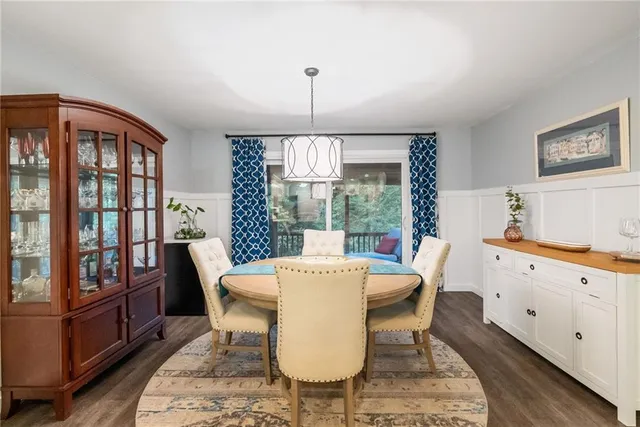 a spacious bathroom with a double vanity sink a mirror and a shower