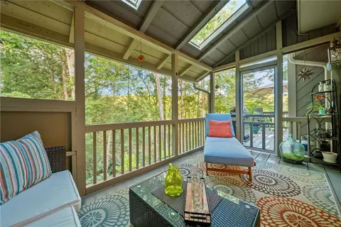 a bedroom that has a bed and a window